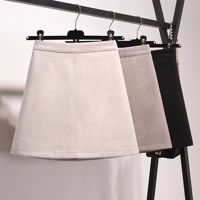 杏色半身裙毛呢秋冬女2019新款黑色高腰显瘦a字包臀裙外穿ins短裙