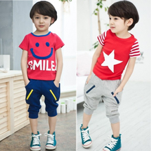 2013 new summer children's smiling face cartoon short-sleeved T-shirt harem pants boys two-piece suit small and medium-sized children's clothing