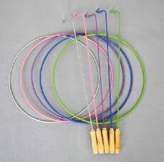 Катание обруча Нажим руки рулон обруч