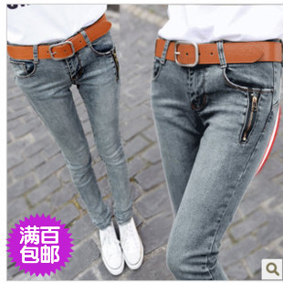 <em>淘宝网秋装</em>新款<em>韩版女装</em>烟灰色修身破洞牛仔裤
