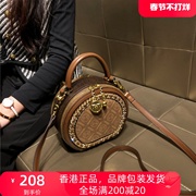 香港包包女斜挎2023迷你女士手提小圆包真皮高级单肩小包