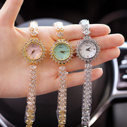 时装表镶钻时尚女士手表，贝母面花形指针式，石英防水手链款腕表
