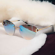 2022个性时尚优雅洋气，欧美女潮防紫外线无框镶钻猫眼墨镜太阳眼镜