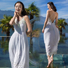 泰国巴厘岛海边度假沙滩，裙波西米亚白色中长款仙女，露背吊带连衣裙