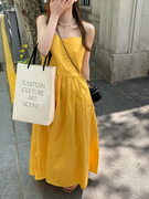 黄色吊带连衣裙女2024早春绝美氛围感夏日长裙海边沙滩裙裙子