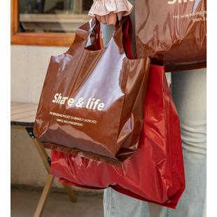 服装店手提袋袋高档棕色印字女装塑料包装袋打包袋装衣服袋子
