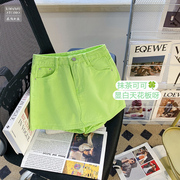 荧光绿色a字牛仔短裙女春夏，2023韩版糖果色阔腿短裤显瘦热裤