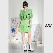 UX经典春夏季女装黄绿色不规则贴标短裙小众设计感时尚气质ins