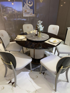 意式轻奢餐桌椅实木真皮后现代，简约餐厅组合家用圆形钢琴烤漆饭桌