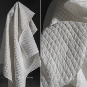 白色小香风格子绗缝棉服夹棉布 立体肌理冬外套创意服装设计面料