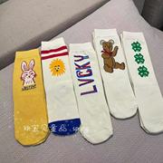 kkbaby韩国童装23春男童女童舒适可爱百搭米色黄色卡通中筒袜子