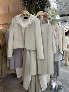 春季韩版宽松拼双层娃娃翻领，包扣外套+高腰后橡筋半裙两件套