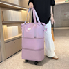 带万向轮的旅行包女轻便大容量，拉杆包行李包旅游(包旅游)收纳袋折叠行李箱
