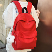 红色书包女初中生大容量，简约百搭纯色双肩包ins风高中大学生背包