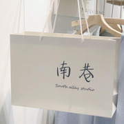 男女服装店袋子logo纸袋手提袋，定制童装购物袋，定制手提袋加厚