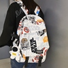 日系书包女2023小学生原宿涂鸦风大容量双肩包大学生休闲背包