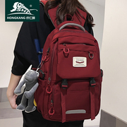 书包女生大学生酒红色韩版百搭大容量，双肩包耐脏(包耐脏)防水可放电脑背包