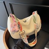 轻便尼龙布包包女2025新款时尚单肩饺子包夏季韩版学生通勤斜挎包