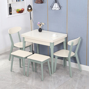 小户型折叠餐桌椅组合家用北欧实木伸缩桌长方形简约钢化玻璃饭桌