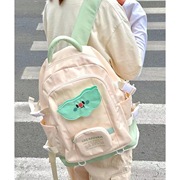 小清新奶油色双肩，包韩版撞色大容量百搭休闲背包可爱高中学生书包