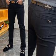 男士轻奢黑色修身显瘦高品质时尚潮流中腰拉链水洗纯色牛仔裤