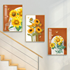 现代简约楼梯间装饰画向日葵，组合复式走廊过道，挂画沙发背景墙三联
