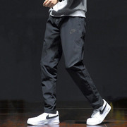 Nike耐克纯黑色速干长裤男跑步训练冰丝运动裤锥形小脚休闲裤