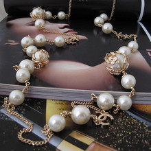 Gao CHANEl2010 pequeño flash modelos con incrustaciones de diamantes explosión hermoso collar de perlas Perla brote largo