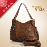 特价2012秋季新款 <span class=H>达芙妮</span>风格女包 正品真皮手提单肩斜挎包 两色