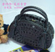 黑色皮编扭花把手提斜挎两用包，精制小巧