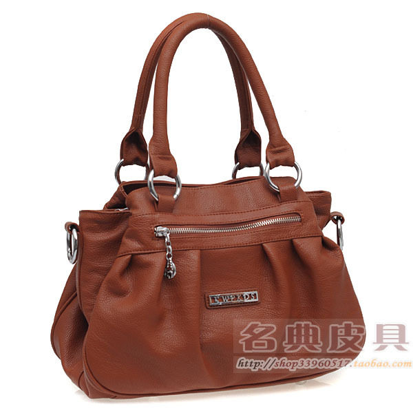 2010新款韩版正品啄木鸟特价<em>女包</em>手提单肩包