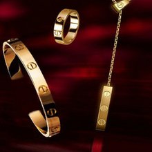 Cartier Cartier serie AMOR de Yucca 14K de oro de viviendas de lujo de diamantes pulsera de regalo agujeros de los clavos par de hombres y mujeres