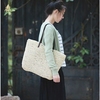 韩版女包包潮流包休闲编织单肩大包袋手提包包草编海边沙滩。