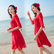 巴厘岛沙滩裙女夏2023仙海边度假连衣裙红色修身显瘦海滩短裙